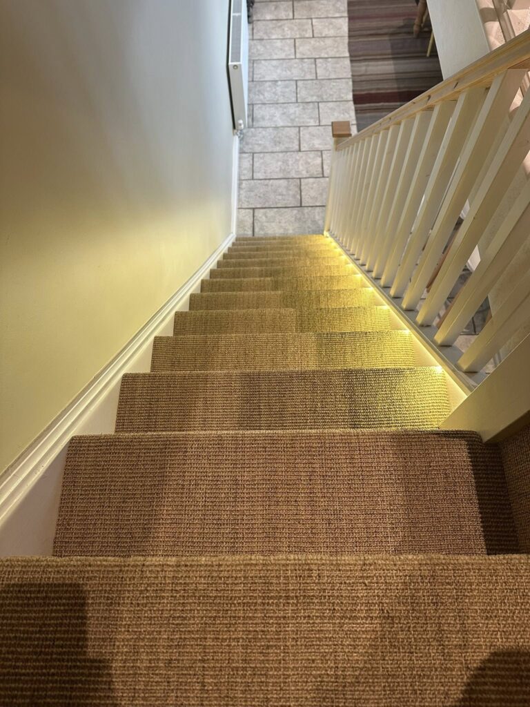 Cottage Staircase carpet installed by Kernow Carpets
